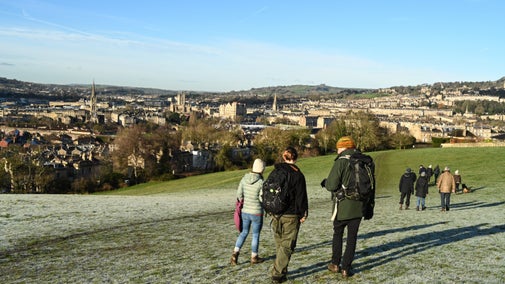 Walkers in Smallcombe Vale on the Bath Skyline